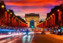 شارع الشانزليزيه في باريس مع متاجر فاخرة وأضواء مبهجة Arabesch - أخبار عربية في أوروبا